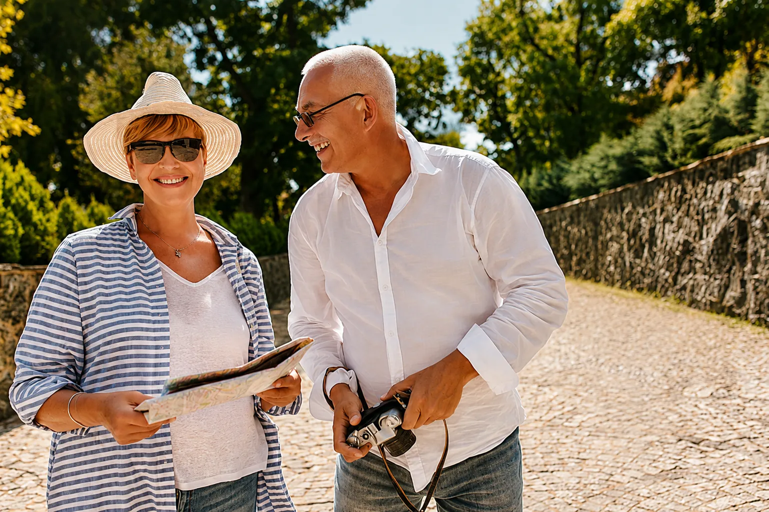 Couple with a map on a private guided walking tour in Belgium
